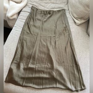 Lush green satin midi skirt.